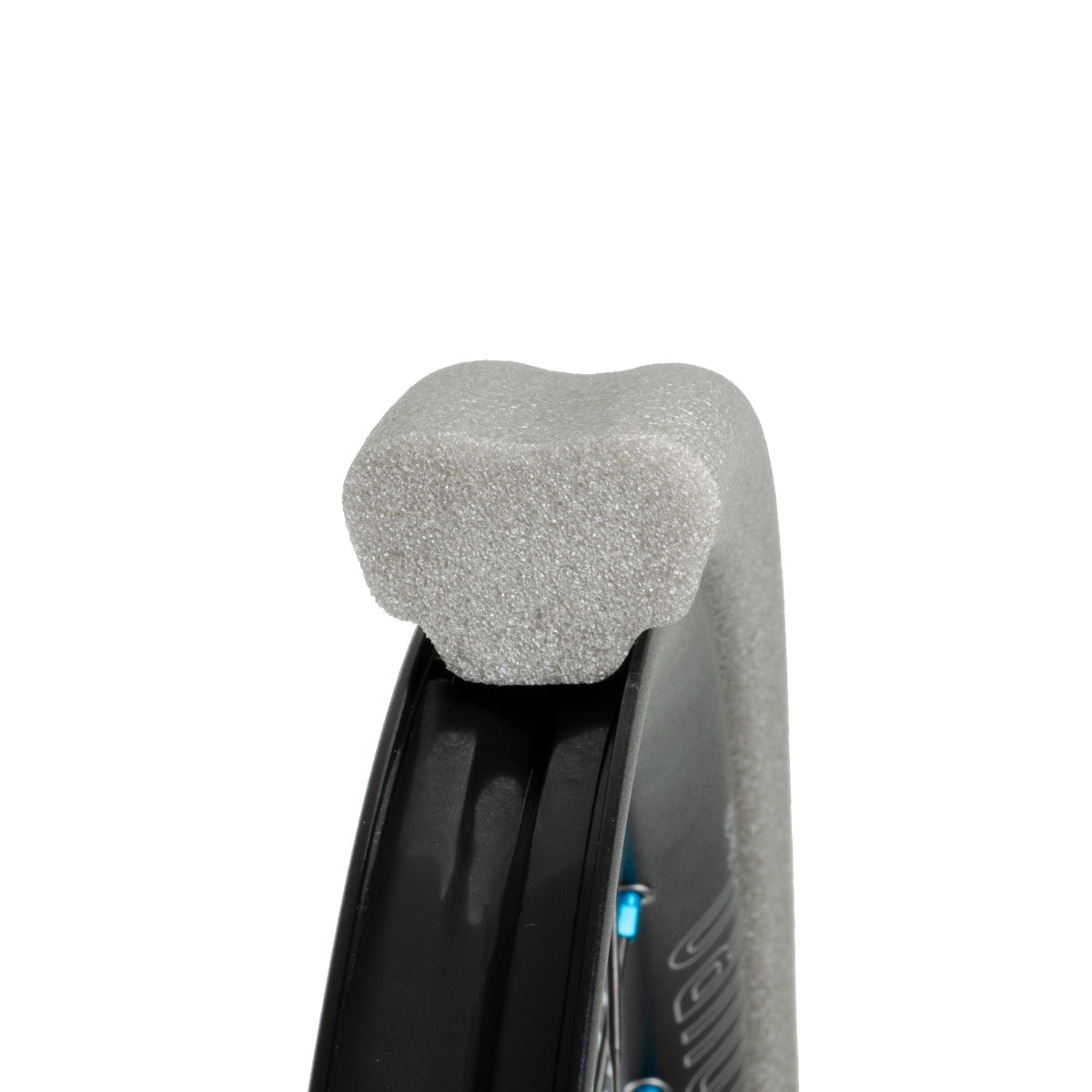 Closeup of Gnarly grey tubeless tyre insert  seated on mtb rim white background