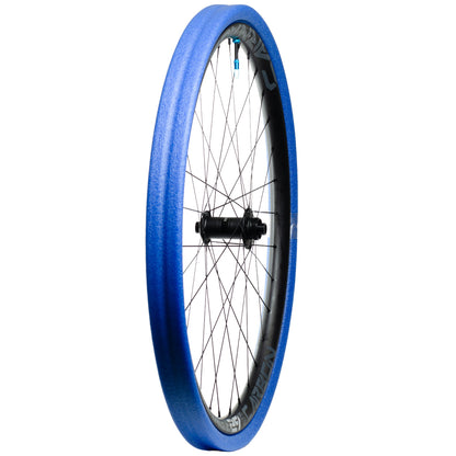 Gnarly blue tubeless tyre insert mounted onto carbon mtb rim