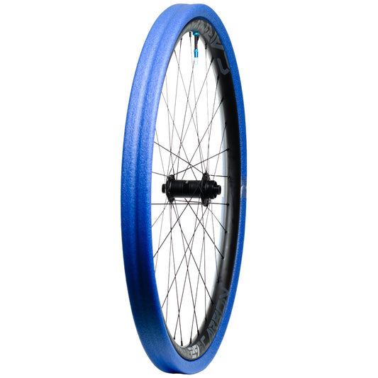 Gnarly blue tubeless tyre insert mounted onto carbon mtb rim